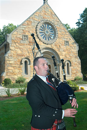 Adam piping at a wedding
